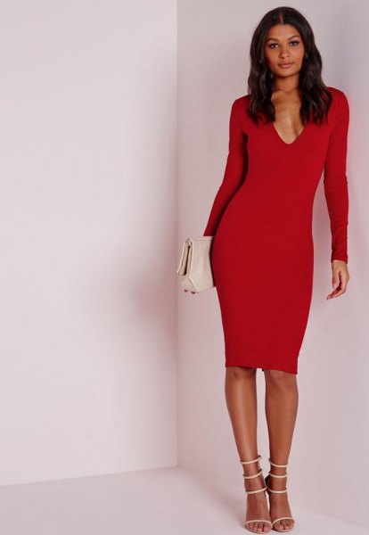 red long-sleeved deep v-mid waist dress with white heels with open toe