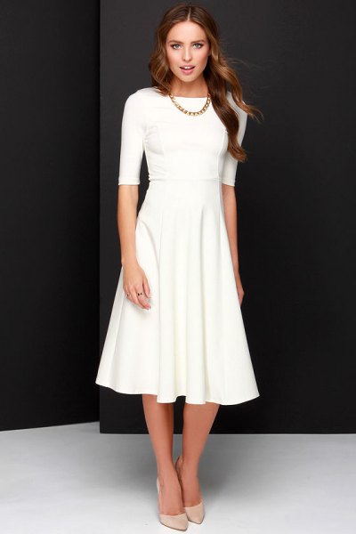 white half-heated fit and flare midi dress with light pink heels