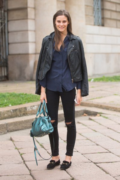 black leather jacket with dark blue button up shirt