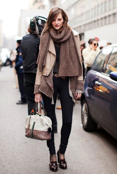 gray knitted scarf with pale pink leather jacket and black loafers