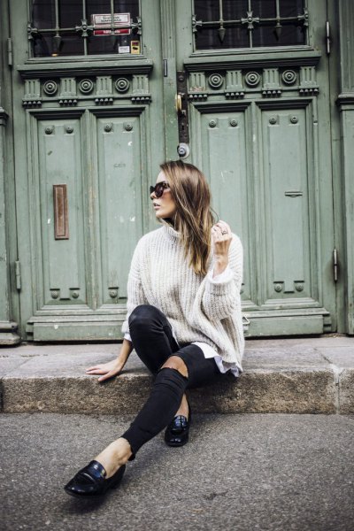 white turtleneck-ribbed chunky sweater with black leather boards