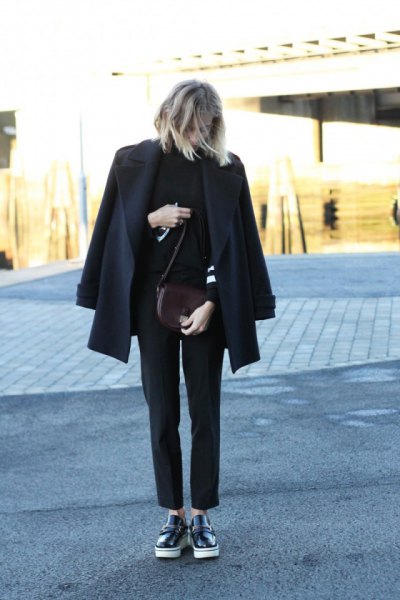 black wool coat with hollow sweater and leather boards