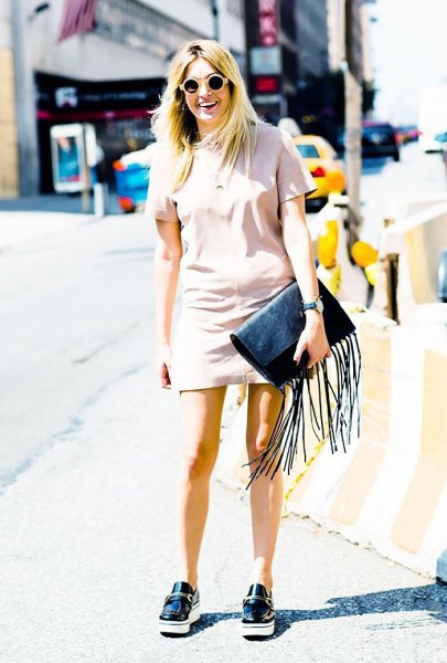 pale pink short-sleeved mini-shift dress with black loafers