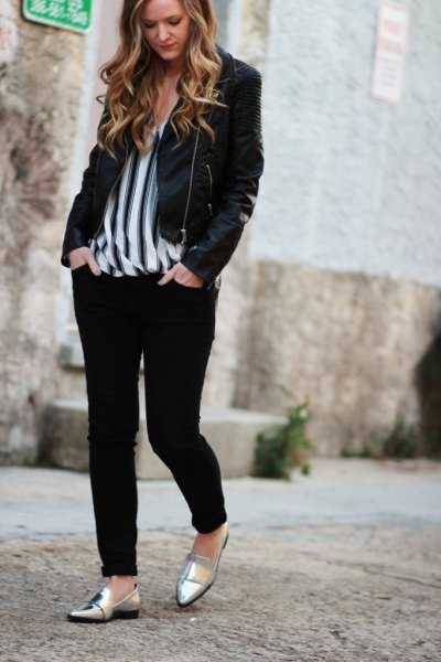 black casual blazer with vertically striped chiffon blouse and metal boards