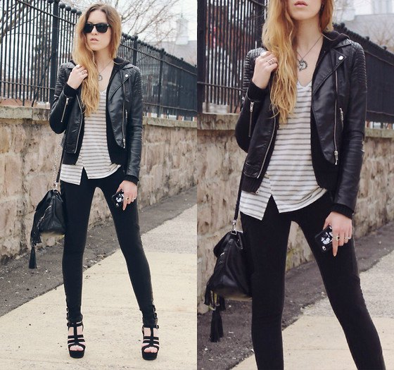 fitted moto jacket with gray and white striped topped v-neck and slim jeans