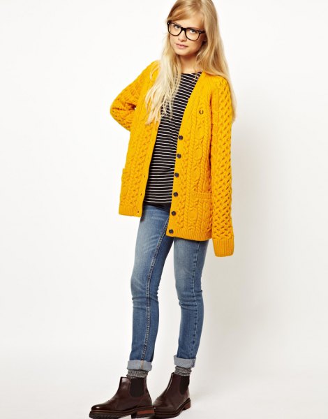 mustard yellow knitted cardigan with cuffed jeans and leather shoes