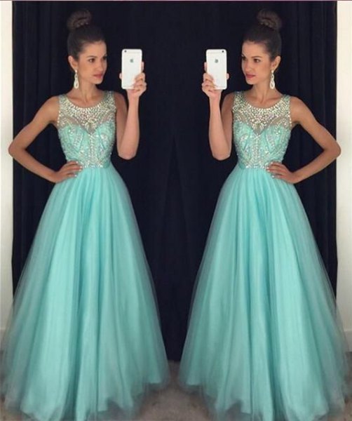 white and turquoise fit and flare pleated floor length dress