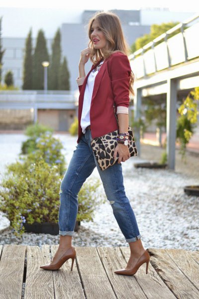 burgundy blazer with white blouse and gray blue cuffed jeans