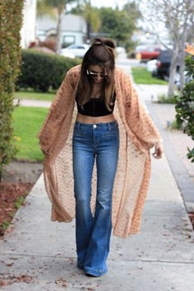 green midi clean cardigan with black crop top and flared jeans