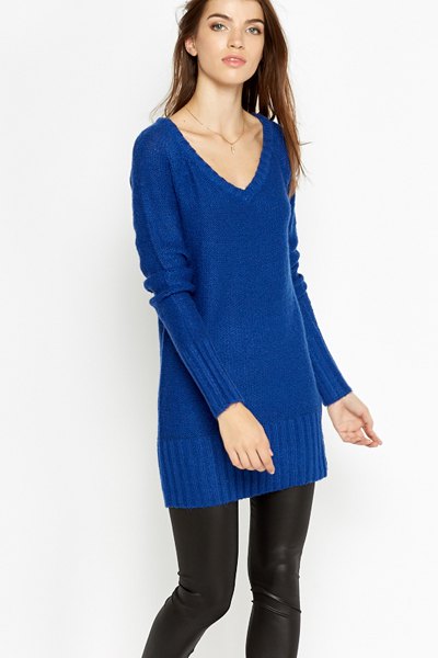 royal blue t-shirt with v-neck sweater with black leather leggings