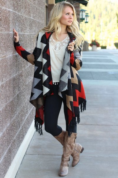 navy and orange zigzag printed fringed cardigan with long boots