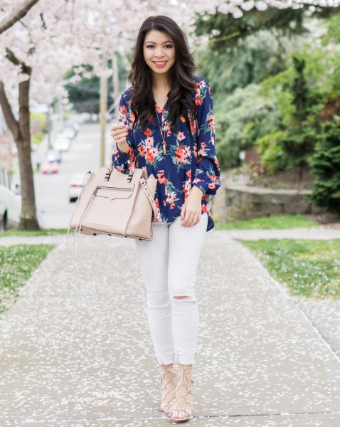 navy blue floral printed button up shirt with white jeans