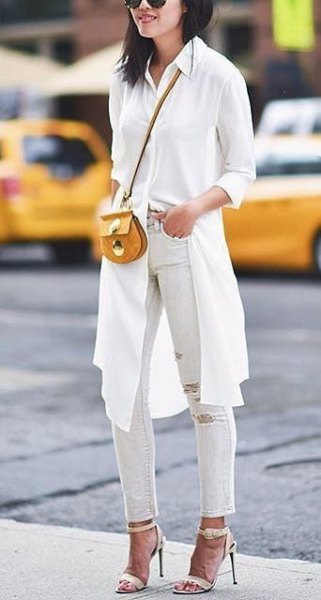 white knee length blouse with ripped ankle jeans