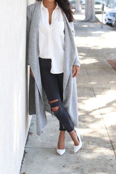 gray long line sweater cardigan with white shirt and ripped jeans