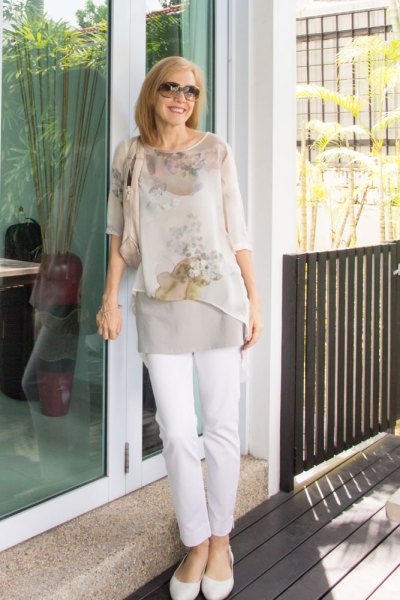 light pink floral printed chiffon blouse with white slim fit jeans