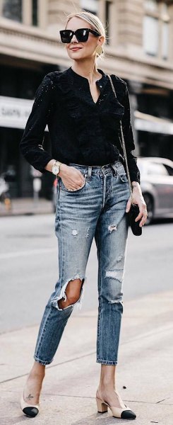 black mini v-neck blouse with ripped slim ankle jeans