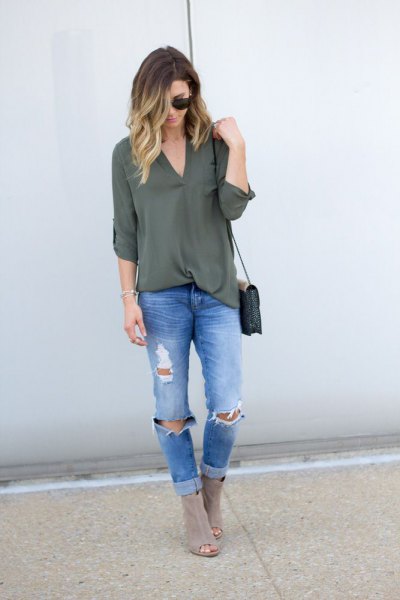 green chiffon with blue ripped slim fit jeans and gray boots