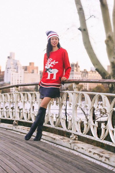 red christmas holiday sweater with black mini skirt