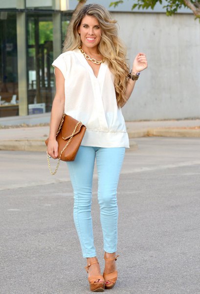 white hat with jacket with colored skinny jeans