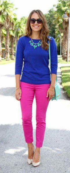 royal blue knit sweater with hot pink slim fit jeans