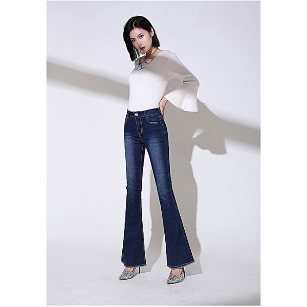 white watch sleeve top with dark blue high rise bell bottom jeans