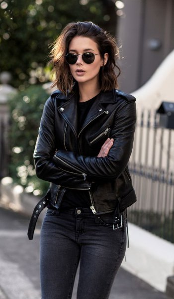 black moto leather jacket with dark jeans