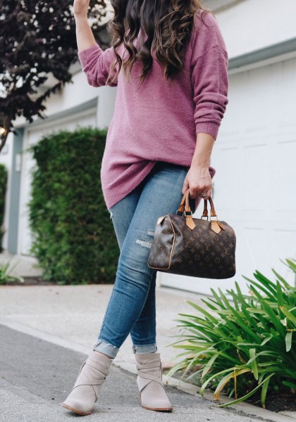 gray chunky knitted sweater with blue jeans and ankle boots