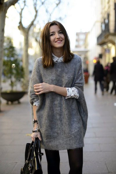 gray big sweater with white and black printed button up shirt