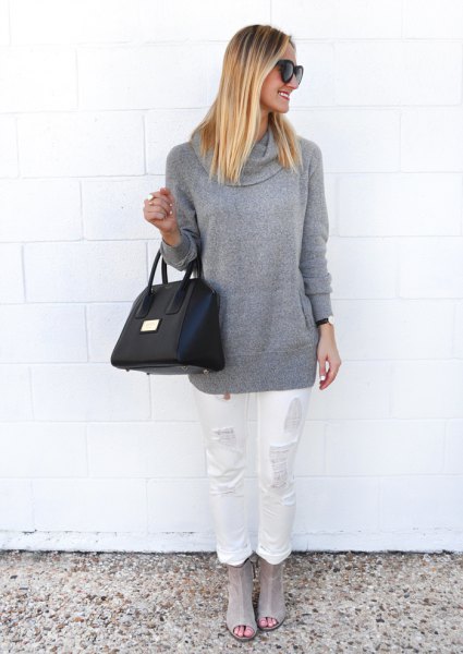 gray chunky sweater with white ripped jeans with straight legs