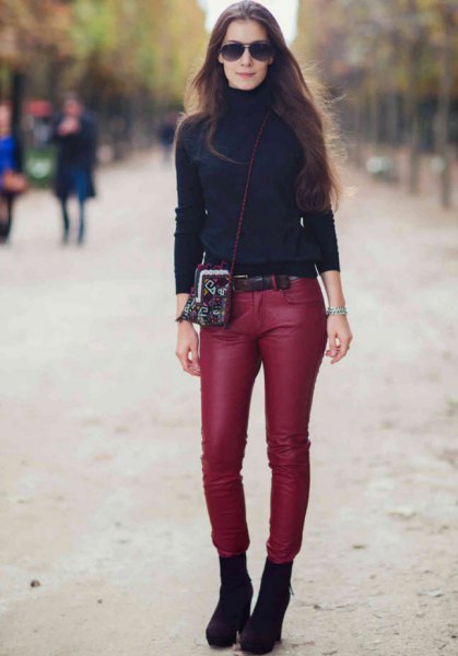 black turtleneck sweater with red skinny pants