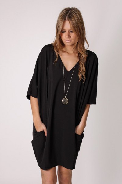 black half sleeve side pocket v-neck tunic dress