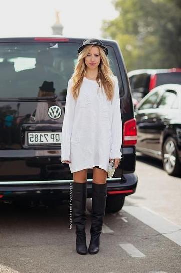 white long sleeve dress with black felt hat and leather shoes