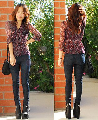 black chiffon semi sheer blouse with dark skinny jeans and high heeled ankle boots