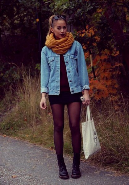 blue denim jacket with lime green scarf and black mini dress