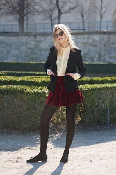 black blazer with burgundy mini skater skirt and velvet flats