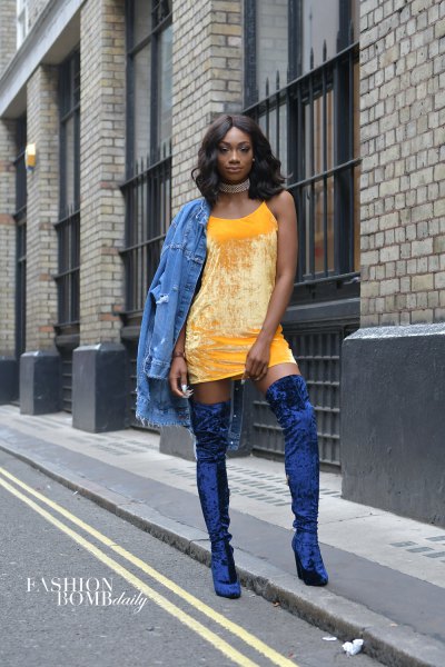 yellow mini shift dress with denim jacket and blue velvet high boots