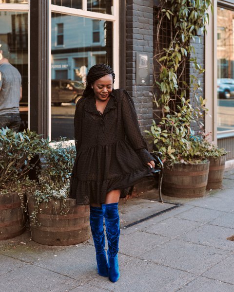 black mini ruffle long sleeve dress with blue velvet thigh high boots