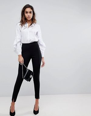 white puff sleeve button up shirt with black high chinos