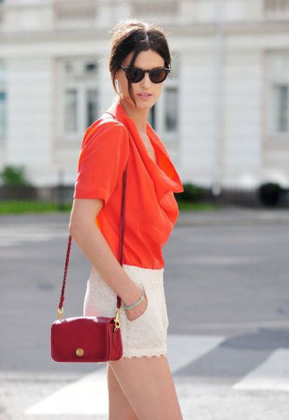 red blazer blouse with small brown leather handbag