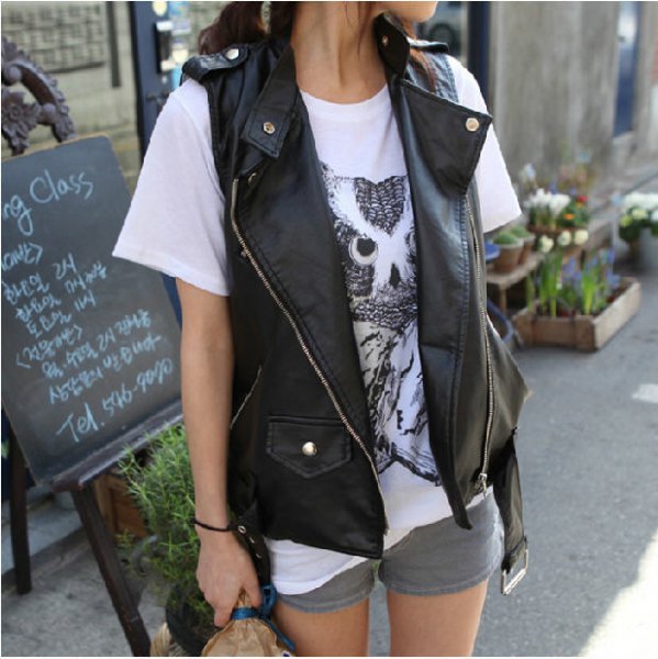 black biker vest with white print tee and gray mini shorts