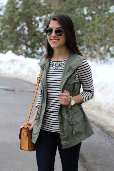 striped long sleeve tee with silver necklace and work vest