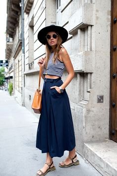 black and white striped cropped tank top with navy maxi blown skirt