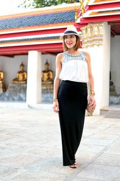 white stem printed top with black maxi skirt
