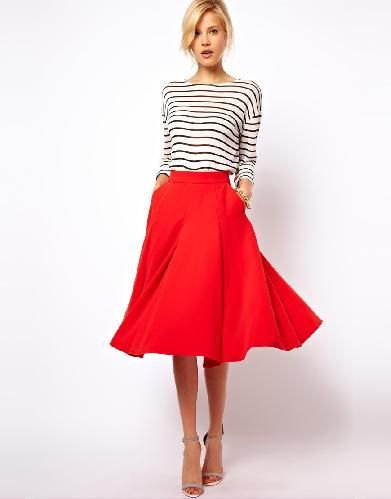 black and white striped long-sleeved tee with red midi-extended skirt