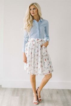 light blue shirt with white floral printed pleated chiffon skirt with pockets