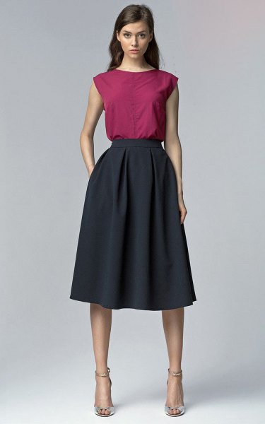 gray sleeveless top with navy blue flared midi skirt