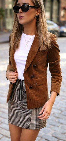 brown suede blazer with white fitted top and checkered mini skirt