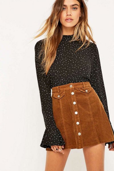 black and white polka dot bell blouse with brown mini skirt