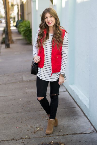 red quilted vest with black and white striped long sleeve tee
