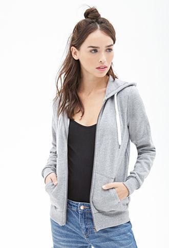 gray hooded jacket with a black shirt on the neck and slim jeans